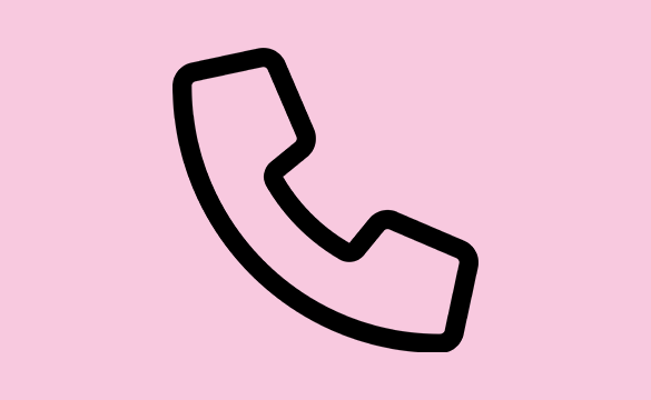 Telefon på rosa bakgrund
