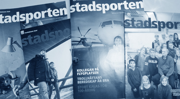 Redigerad bild på en hög med Stadsportens tidning