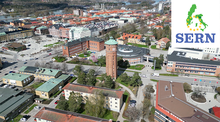 Vy över Trollhättan med SERN:s logotype.