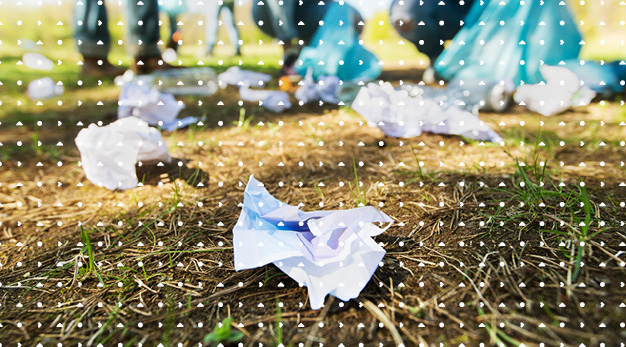 Människor som plockar skräp i naturen.