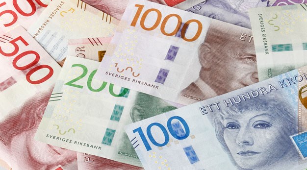Bilden visar olika valörer av svenska sedlar
