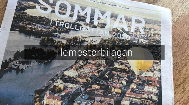 Bilden visar en tidning som handlar om sommaraktiviteter i Trollhättan
