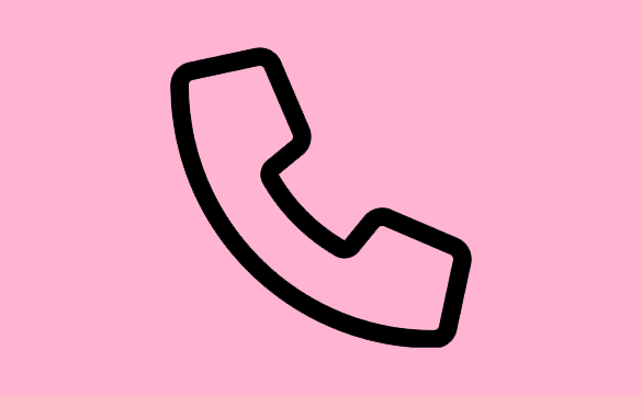 Telefon mot rosa bakgrund.