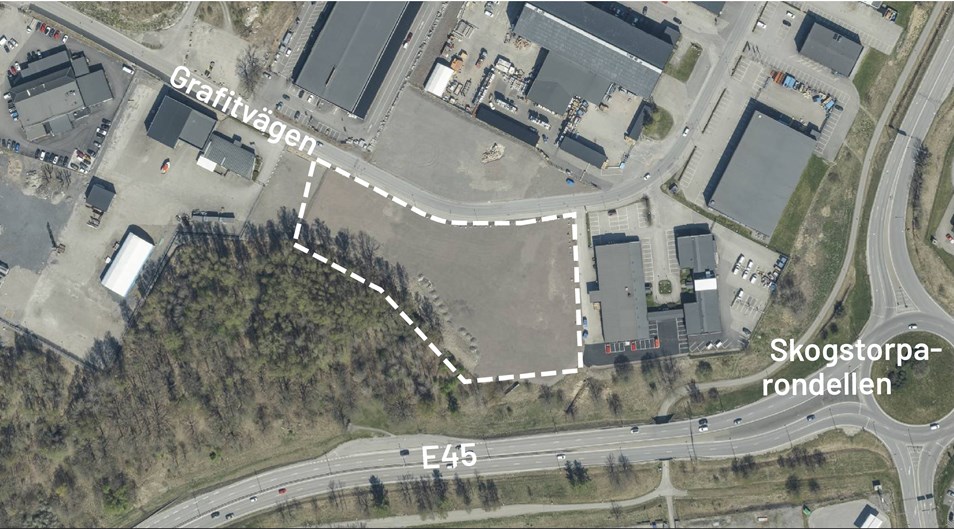 Flygfoto med planområdet markerat med vitstreckat område