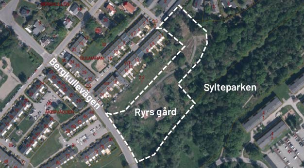 Flygfoto över planområdet markerat med vitstreckat område