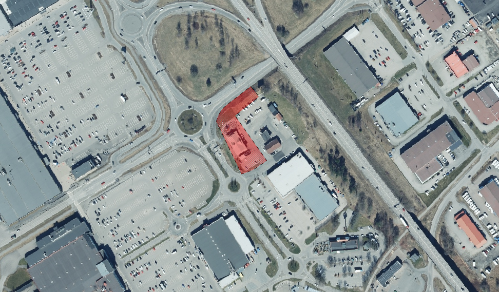 Flygfoto med planområdet markerat med rött.